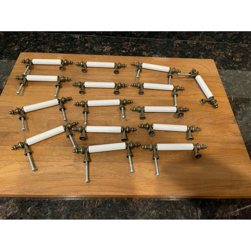 16 Amerock Royal Brass with ceramic White cabinet handles